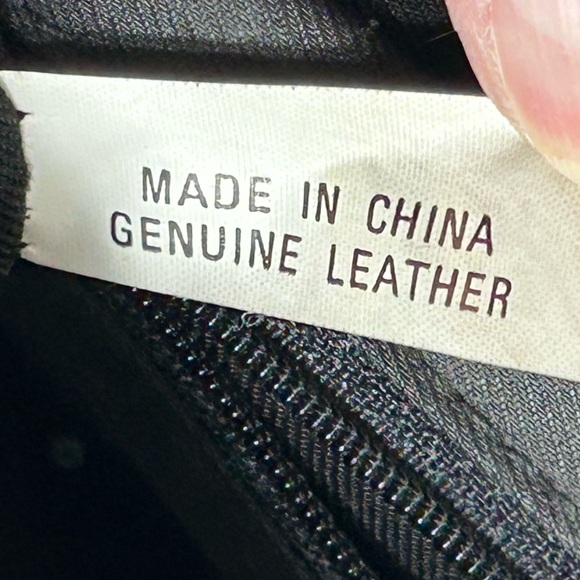 Tignanello Black Crossbody Leather Bag with Tassel Charm - Picture 11 of 12